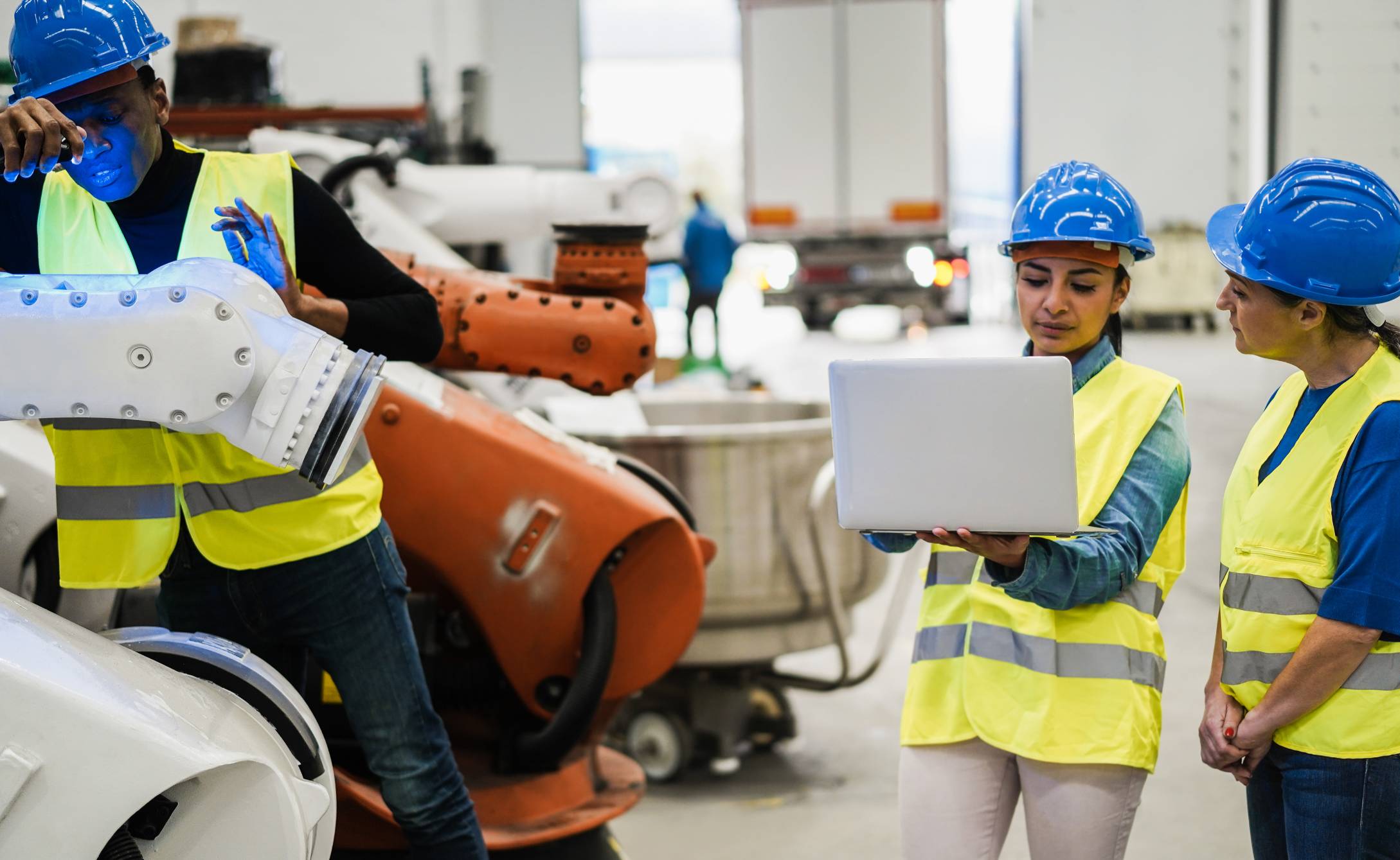 multiethnic-engineers-working-inside-robotic-facto-2025-02-22-17-11-13-utc