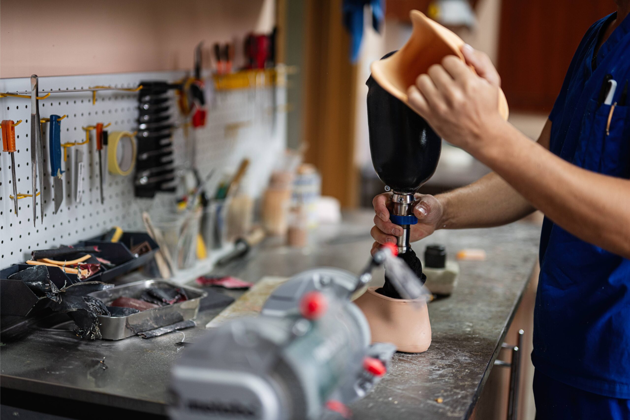 technician-assembling-prosthetic-leg-in-a-workshop-2025-02-11-15-18-40-utc